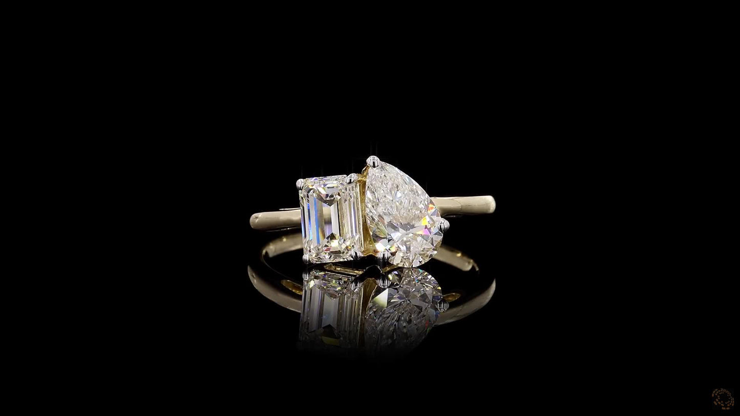 emerald and pear-shaped toi et moi diamond ring