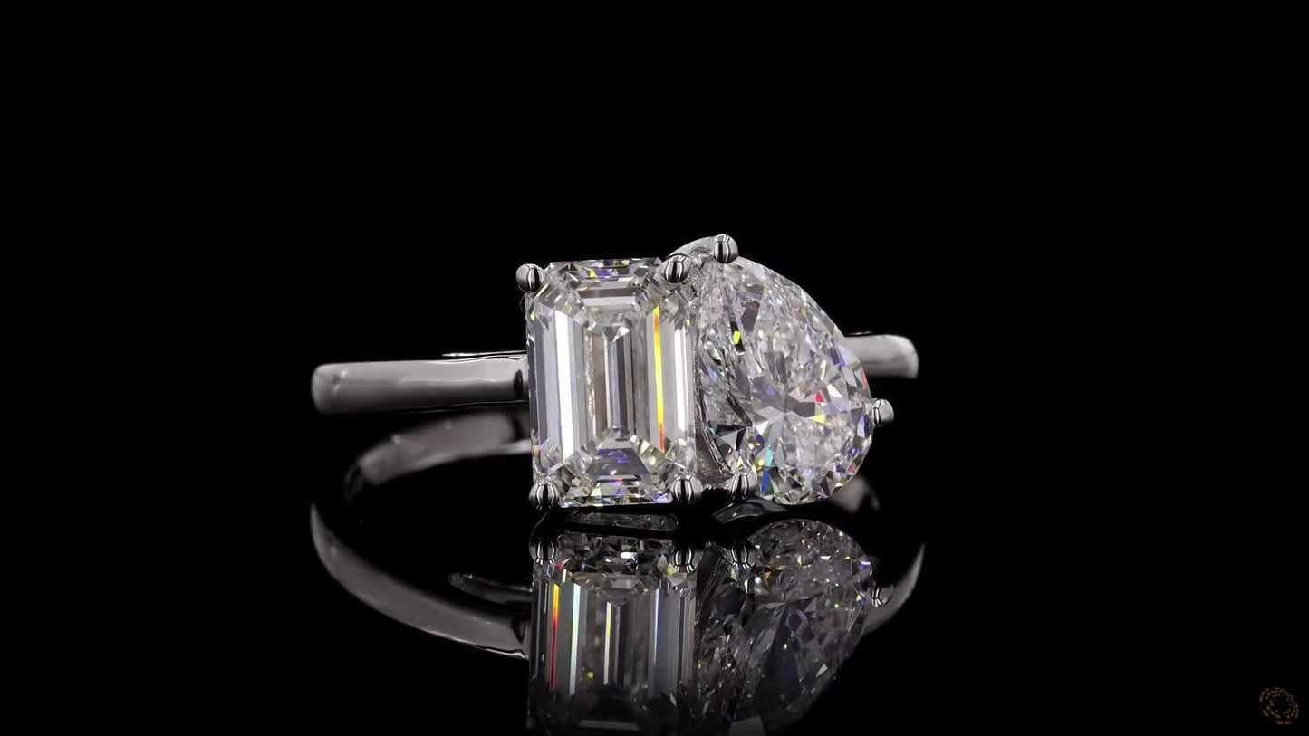 emerald and pear-shaped toi et moi diamond ring